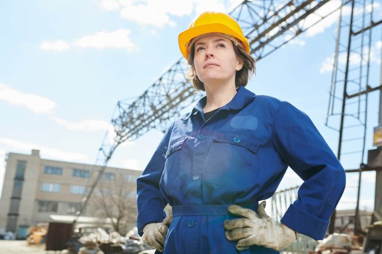 confident woman posing at construction site 768x512 1